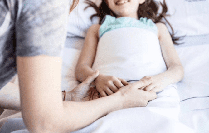 Science says putting the kids to bed early will make you a happier mum