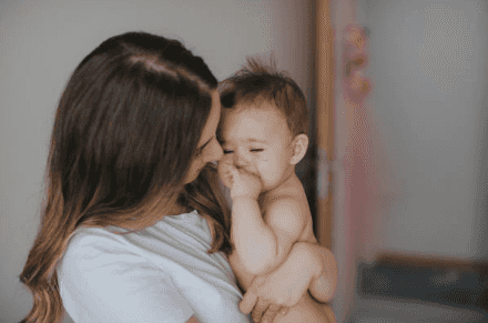 What side you hold your baby on could say a lot about your personality