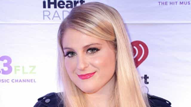 Meghan Trainor announces she is pregnant with cute Christmas themed photo