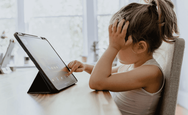 Parents’ mental health is being affected by children’s screen time, new study finds