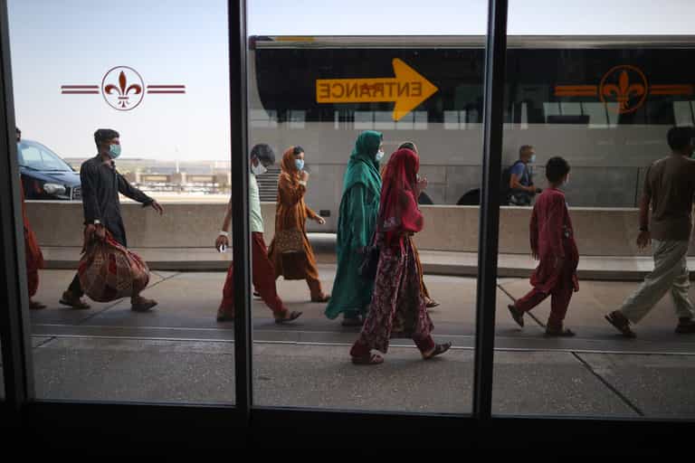 Baby boy lost in Afghan airport finally reunited with his family