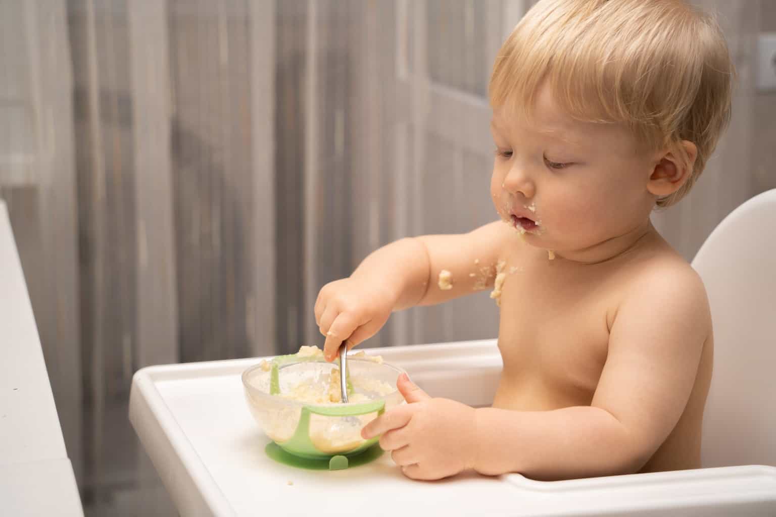 Professor of paediatrics advises parents to introduce food sooner to avoid allergies