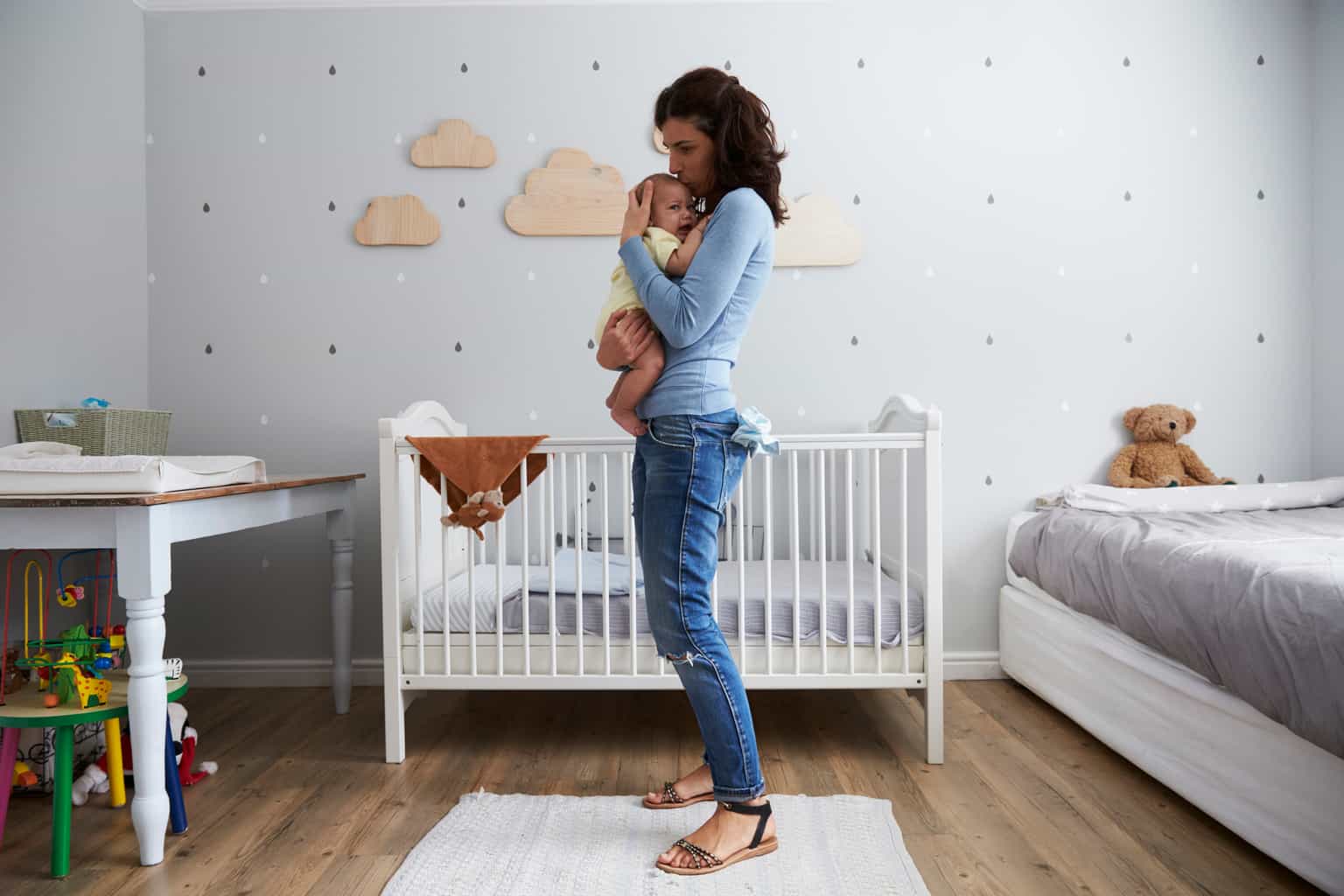 Research says that picking up your crying baby has a positive effect later in life