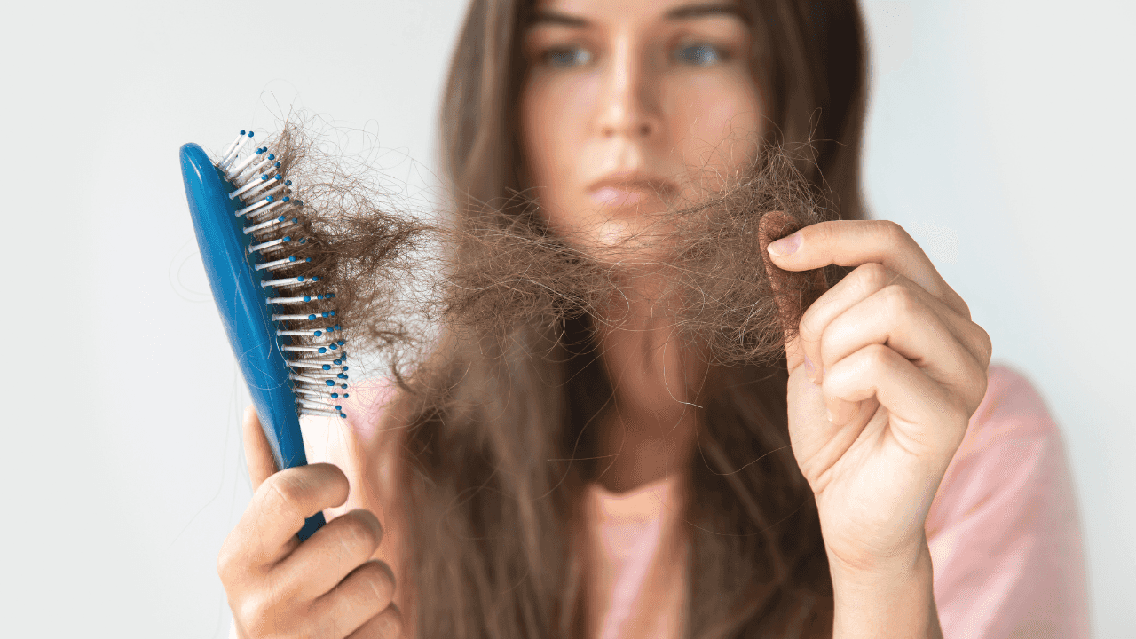 Everything you need to know about postpartum hair loss