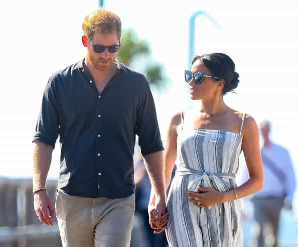 Why Meghan can’t keep her hands off her baby bump, according to a midwife Why Meghan can’t keep her hands off her baby bump, according to a midwife