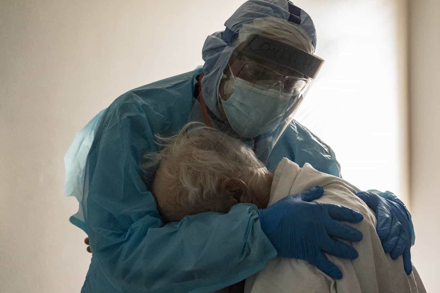 Image of doctor comforting Covid patient in Texas hospital goes viral