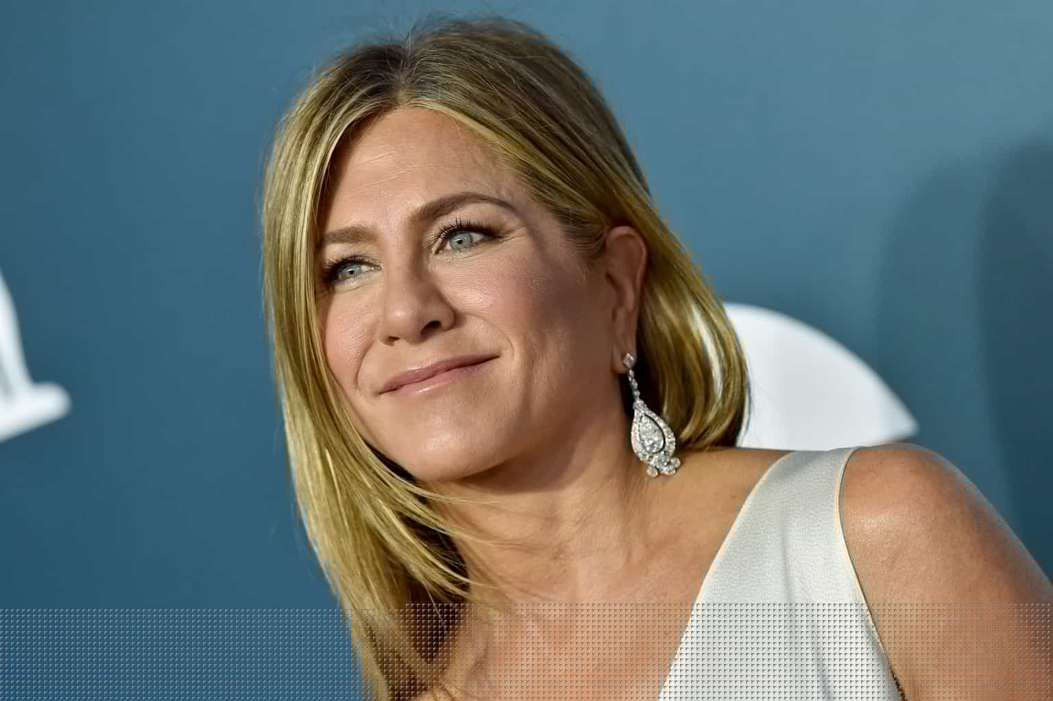 Jennifer Aniston says baby news at Friends reunion “never happened”