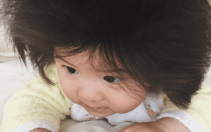 This baby has 70,000 Instagram followers because of her gorgeous head of hair