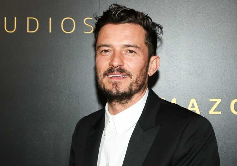Orlando Bloom accidentally misspells his son’s name in his new tattoo