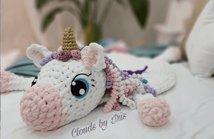 You can crochet this unicorn playmat using your arm – no needles needed
