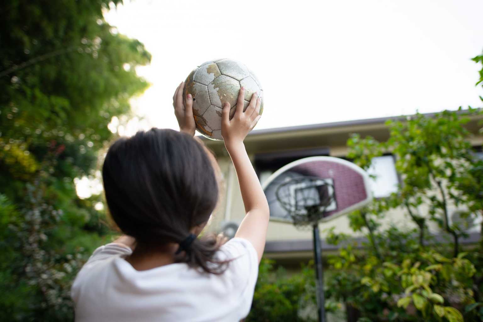 Six year old girl shot after trying to retrieve basketball