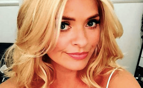 Holly Willoughby is wearing the most DIVINE yellow midi skirt this morning