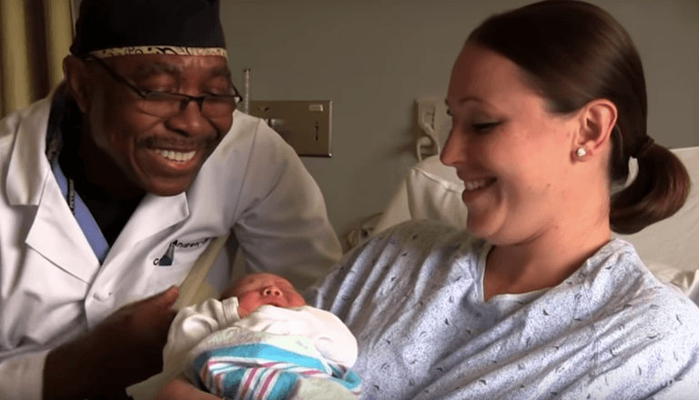 ‘Singing Doctor’ who welcomed all newborn babies with a song receives honour for his ‘beautiful voice’