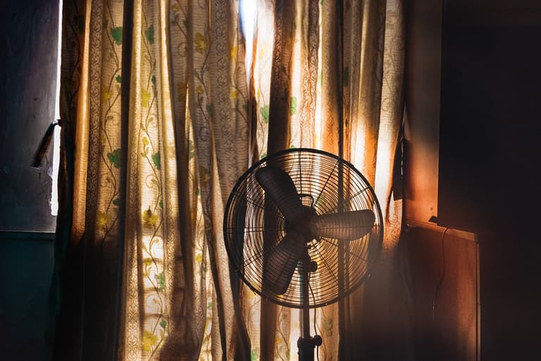 Experts warn not to sleep with a fan on all night (but we’ll probably do it anyway)