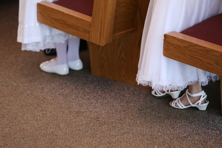 This shop is offering free Communion dresses to families who are struggling financially This shop is offering free Communion dresses to families who are struggling financially