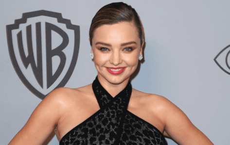 Miranda Kerr debuts her blossoming baby bump at the Golden Globes