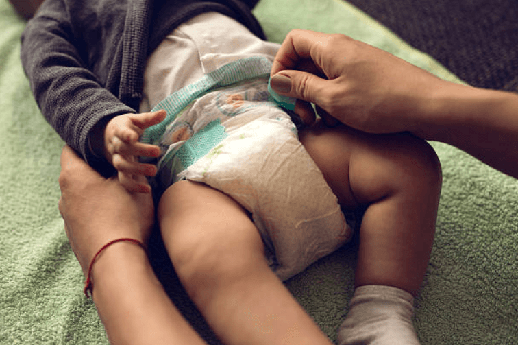 The handy trick that makes all the difference when it comes to changing your little boy’s nappy