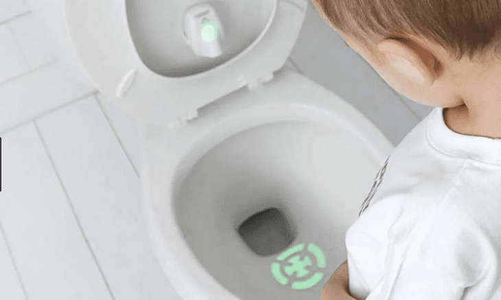 The bullseye toilet bowl light that is teaching little boys to aim better when they pee