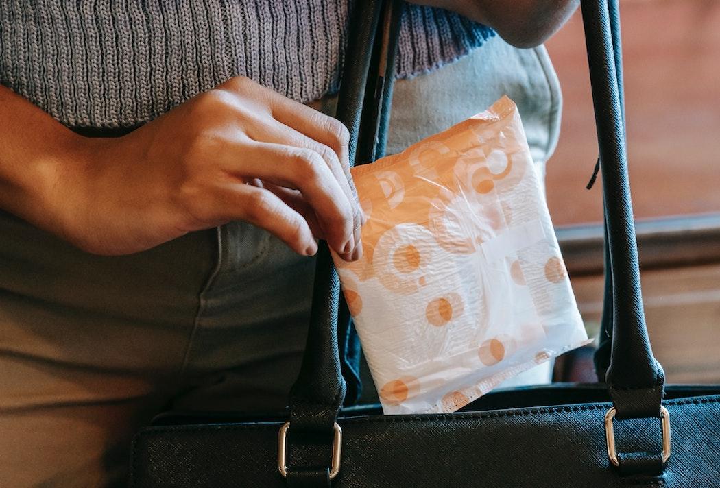 My boss called me out for carrying a sanitary towel to office bathroom- is she wrong?