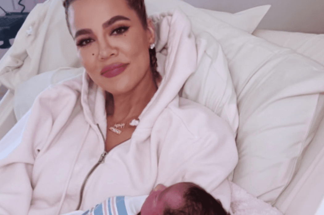 Fans defend Khloe Kardashian for posing in hospital bed with her newborn