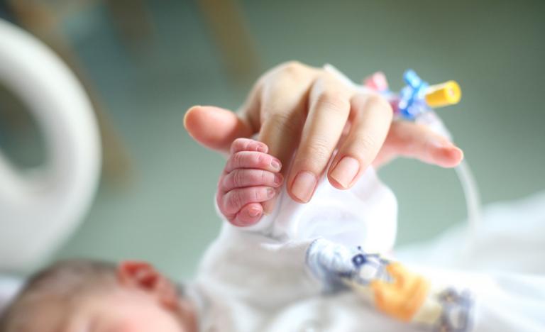 Baby with DNA from three people born for the first time in UK