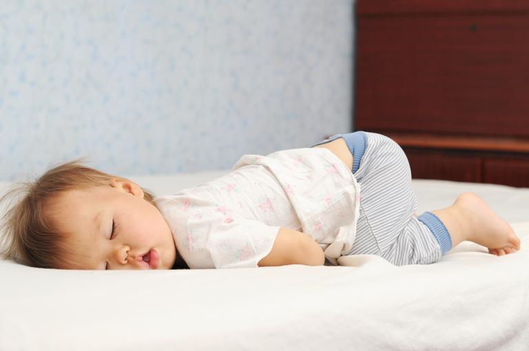 There’s a reason why babies love sleeping with their bum in the air and it’s adorable