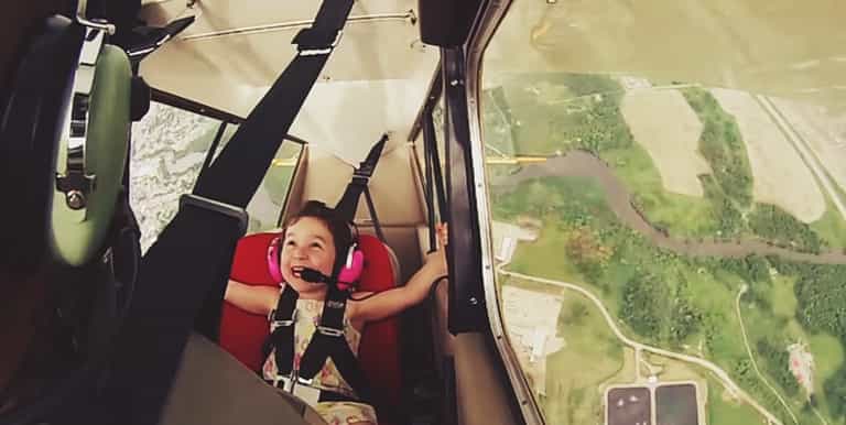 Ready for take-off? This tiny daredevil takes her first white knuckle flight Ready for take-off? This tiny daredevil takes her first white knuckle flight