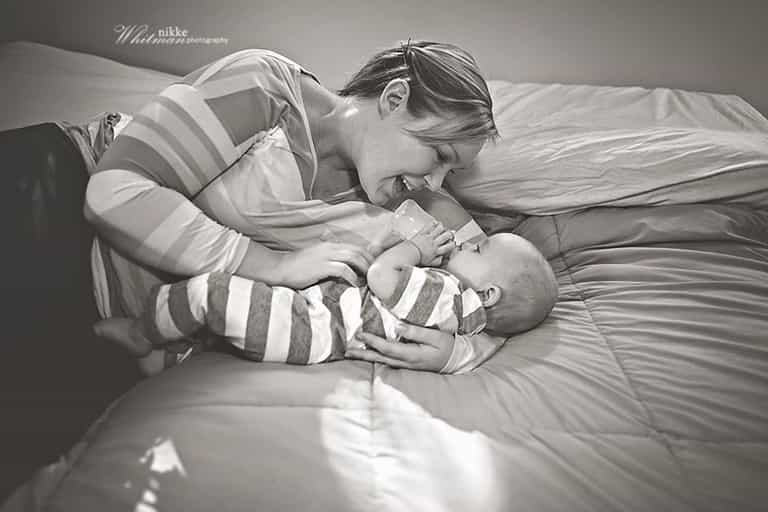 Photographer creates thought-provoking bottle feeding photo series Photographer creates thought-provoking bottle feeding photo series