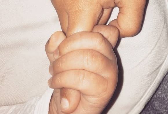 Kim and Kanye Release First Photo of Baby Saint Kim and Kanye Release First Photo of Baby Saint