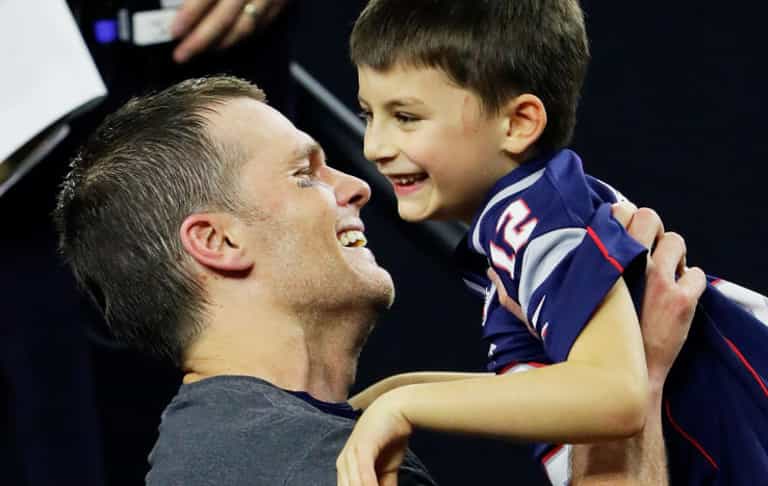 American footballer faces criticism for kissing 11-year-old son on the lips American footballer faces criticism for kissing 11-year-old son on the lips