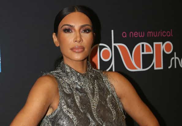 Kim Kardashian admits to photoshopping her daughter North into family Christmas card Kim Kardashian admits to photoshopping her daughter North into family Christmas card