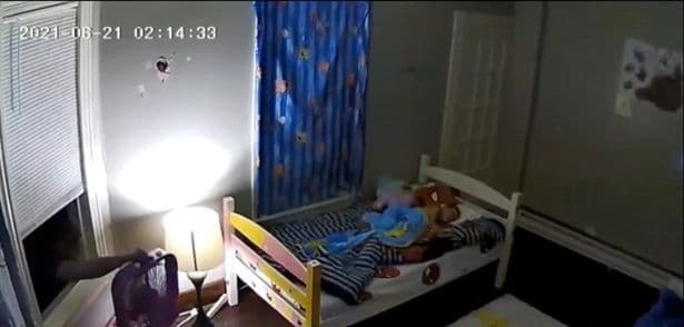 Creepy intruder filmed climbing into bedroom of two young girls as they slept Creepy intruder filmed climbing into bedroom of two young girls as they slept