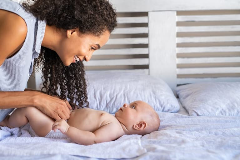Expert claims parents should stop lifting baby’s legs when changing their nappy Expert claims parents should stop lifting baby’s legs when changing their nappy