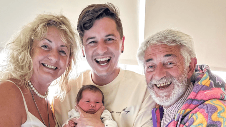 Tadhg Fleming introduces his baby girl to his father Derry Tadhg Fleming introduces his baby girl to his father Derry