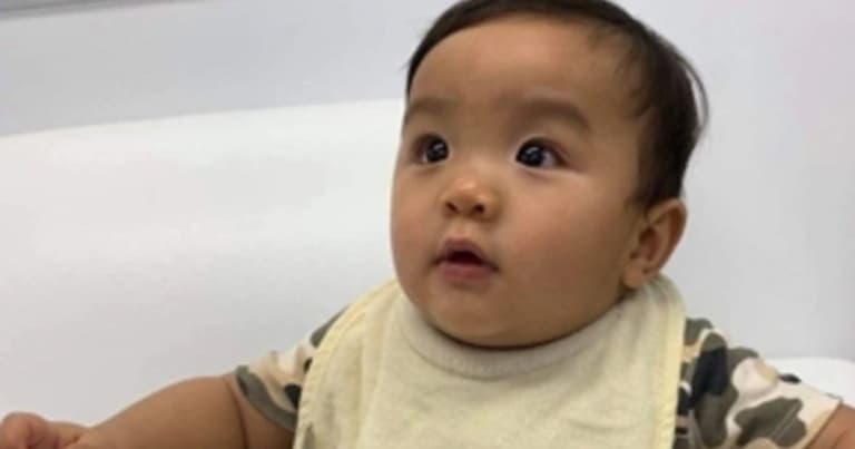 Australian police fear for welfare of baby whose parents claim they left with woman in shop Australian police fear for welfare of baby whose parents claim they left with woman in shop