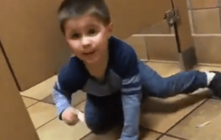 A little boy innocently climbed under a man’s bathroom stall while he was using the toilet A little boy innocently climbed under a man’s bathroom stall while he was using the toilet