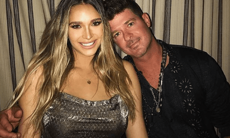 Robin Thicke’s girlfriend April is being harshly criticised for sharing a breastfeeding photo Robin Thicke’s girlfriend April is being harshly criticised for sharing a breastfeeding photo