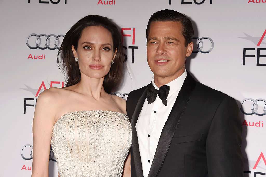 Angelina Jolie ‘doesn’t care’ about Brad and Jen’s reunion – and unfortunately, she’s the only one