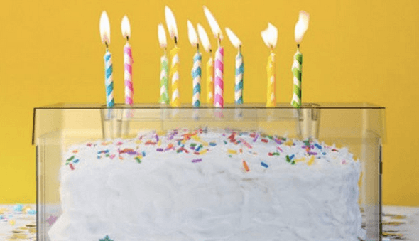 A cake shield will allow children to safely blow out candles on their birthday cake A cake shield will allow children to safely blow out candles on their birthday cake