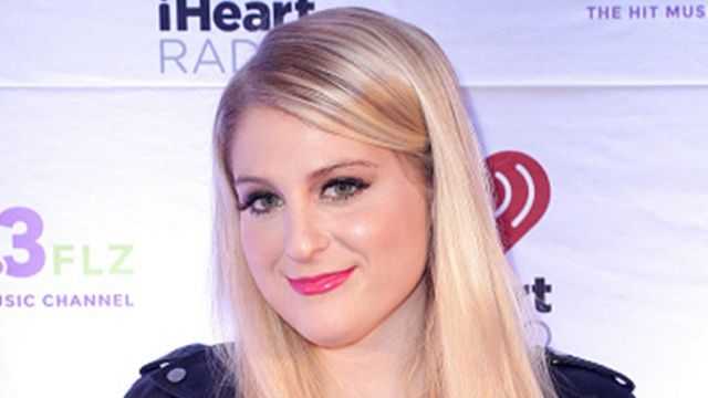 Meghan Trainor announces she is pregnant with cute Christmas themed photo