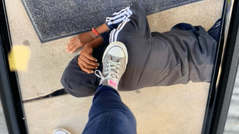 Teacher resigns after taking photo of their foot on Black student’s neck Teacher resigns after taking photo of their foot on Black student’s neck