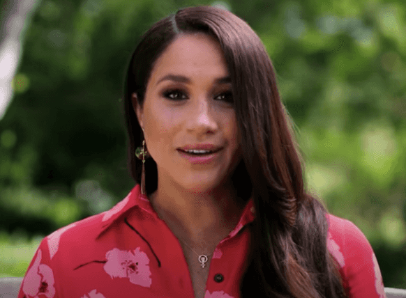 Meghan Markle wears Woman Power jewellery in honour of female empowerment Meghan Markle wears Woman Power jewellery in honour of female empowerment