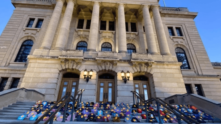Hundreds of backpacks left as memorial to children found in mass grave at residential school Hundreds of backpacks left as memorial to children found in mass grave at residential school