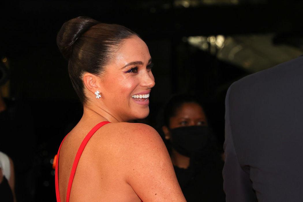 Prince Harry and Meghan Markle make rare red carpet appearance and her dress is flawless