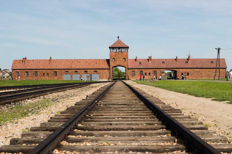 Woman called out after posing for photos on Auschwitz train tracks Woman called out after posing for photos on Auschwitz train tracks