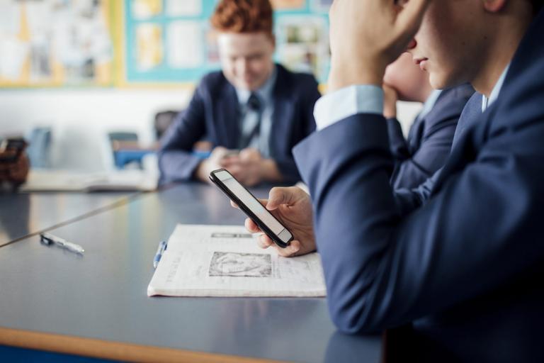 New government law will see mobile phones banned in Irish classrooms New government law will see mobile phones banned in Irish classrooms