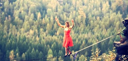 Bad-ass women we admire: The woman who walked the tightrope in heels. In the rain