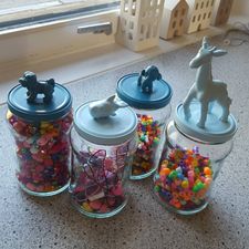 Make cute storage containers from empty jam jars
