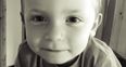 This is Aaron. His mum has chained herself to the Dept. gates in a row over his education.