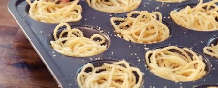 Use a muffin tin to give spaghetti night a fun twist